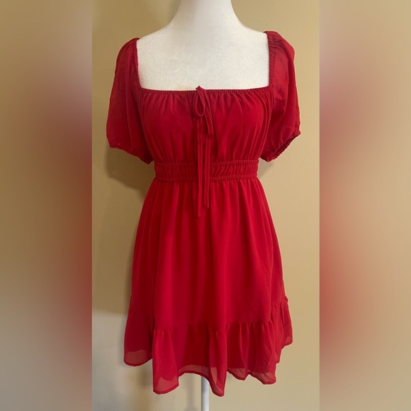 Lelis Dresses & Skirts - 🎉HOST PICK🎉 Leli’s red puff sleeve, open back, tie back flowy mini dress